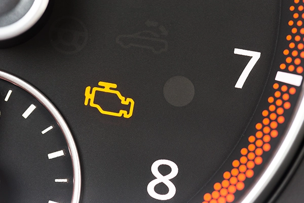 Check engine light icon on dashboard gauge